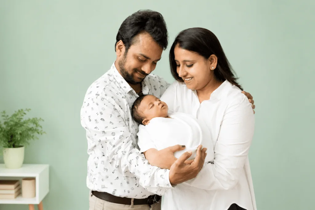 Parents holding their newborn